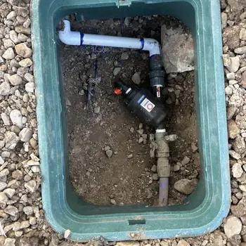New valve and inline filter installed inside a valve box